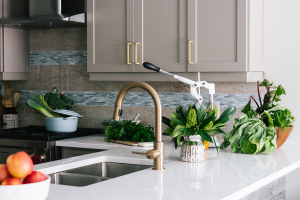 Spring cleaning includes your kitchen counters, cabinets, sink, and drain, as shown in this photo.