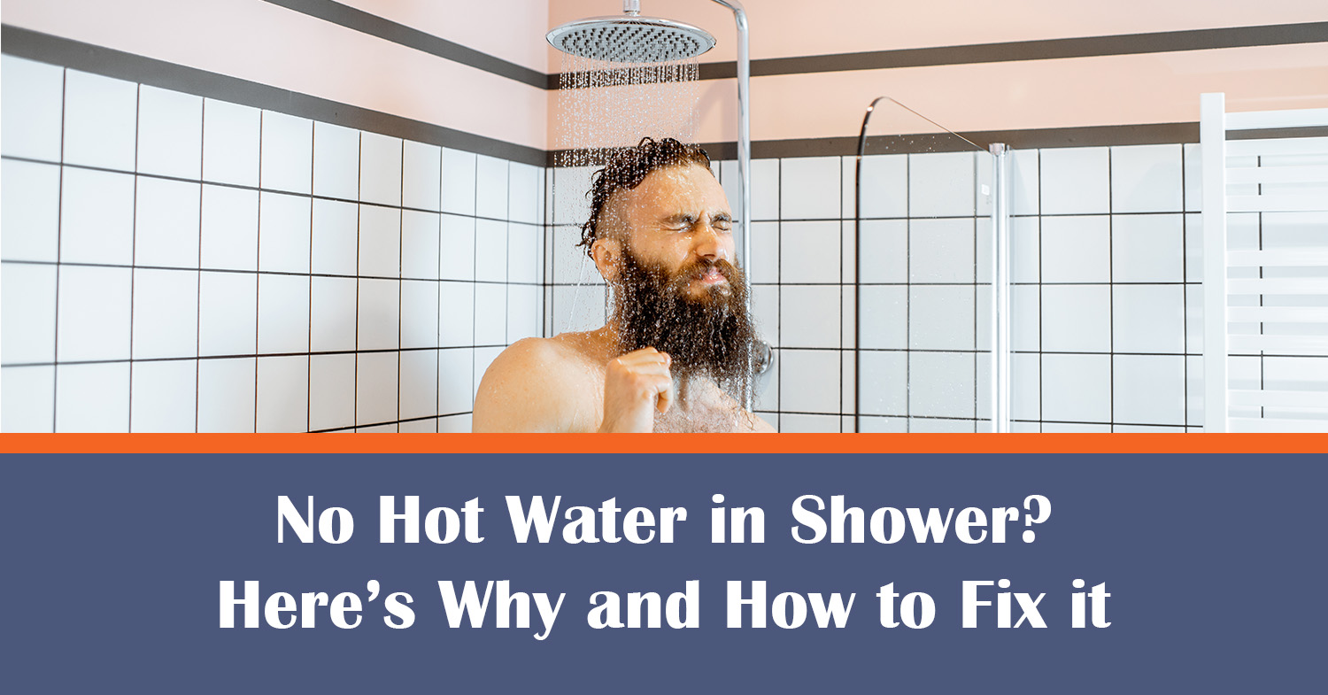 A man taking a shower with no hot water in shower.